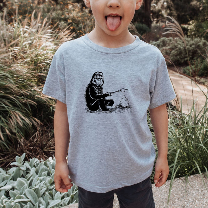 Bigfoot Roasting Marshmallow Toddler TShirt by 208 Tees